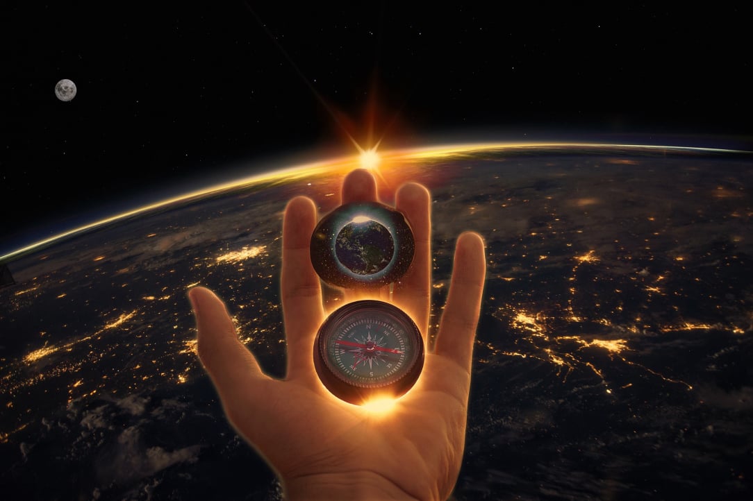 Exploring the world from outer space using a compass in hand
